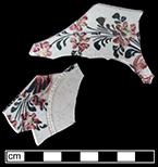 Overglaze enamelled painted creamware saucer fragments - click image to see larger view.